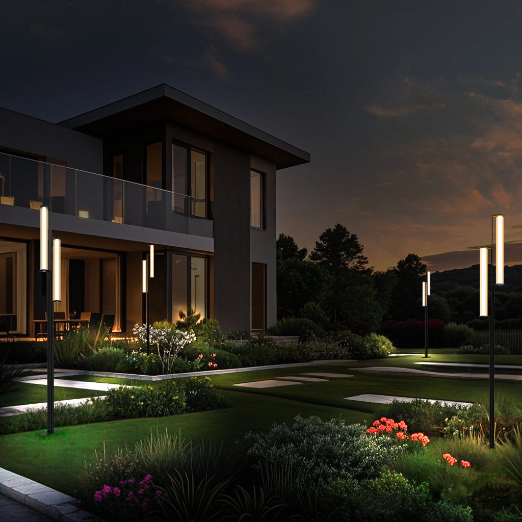 At night, several floor lamps stand sentinel at the four corners of the courtyard, their soft glow harmonizing beautifully with the surrounding trees, creating a serene and cozy ambiance.