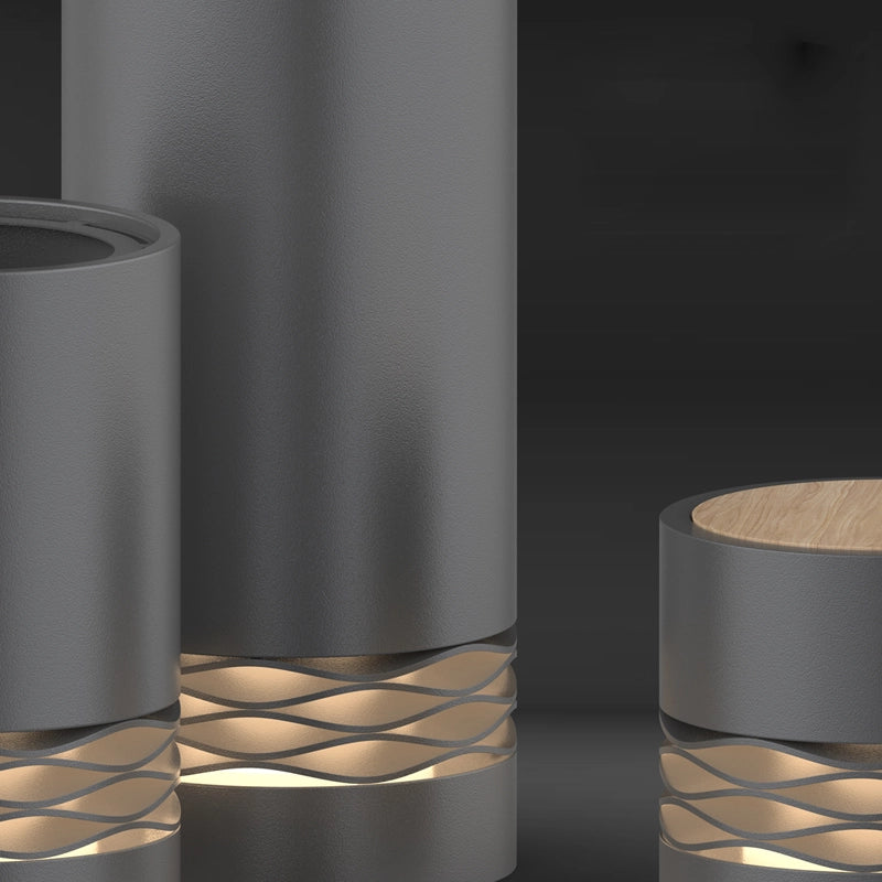 Close-up of details of the three sizes of Outdoor Versatile Cylinder Low Light planters
